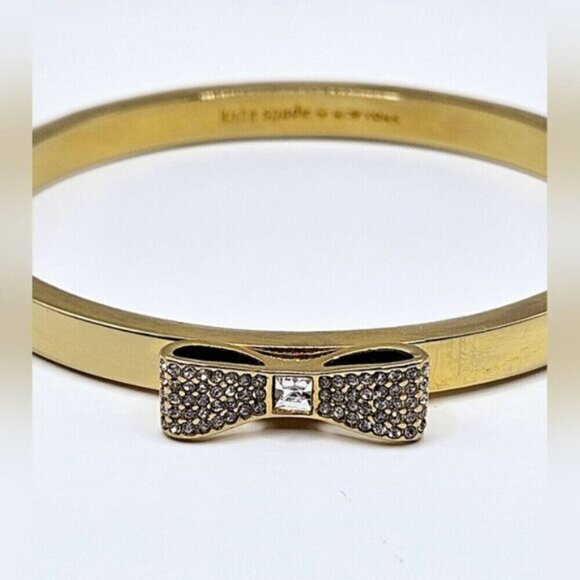 Kate Spade New York Gold-Tone Bow Bangle Bracelet with Crystals + Pouch - Picture 7 of 10
